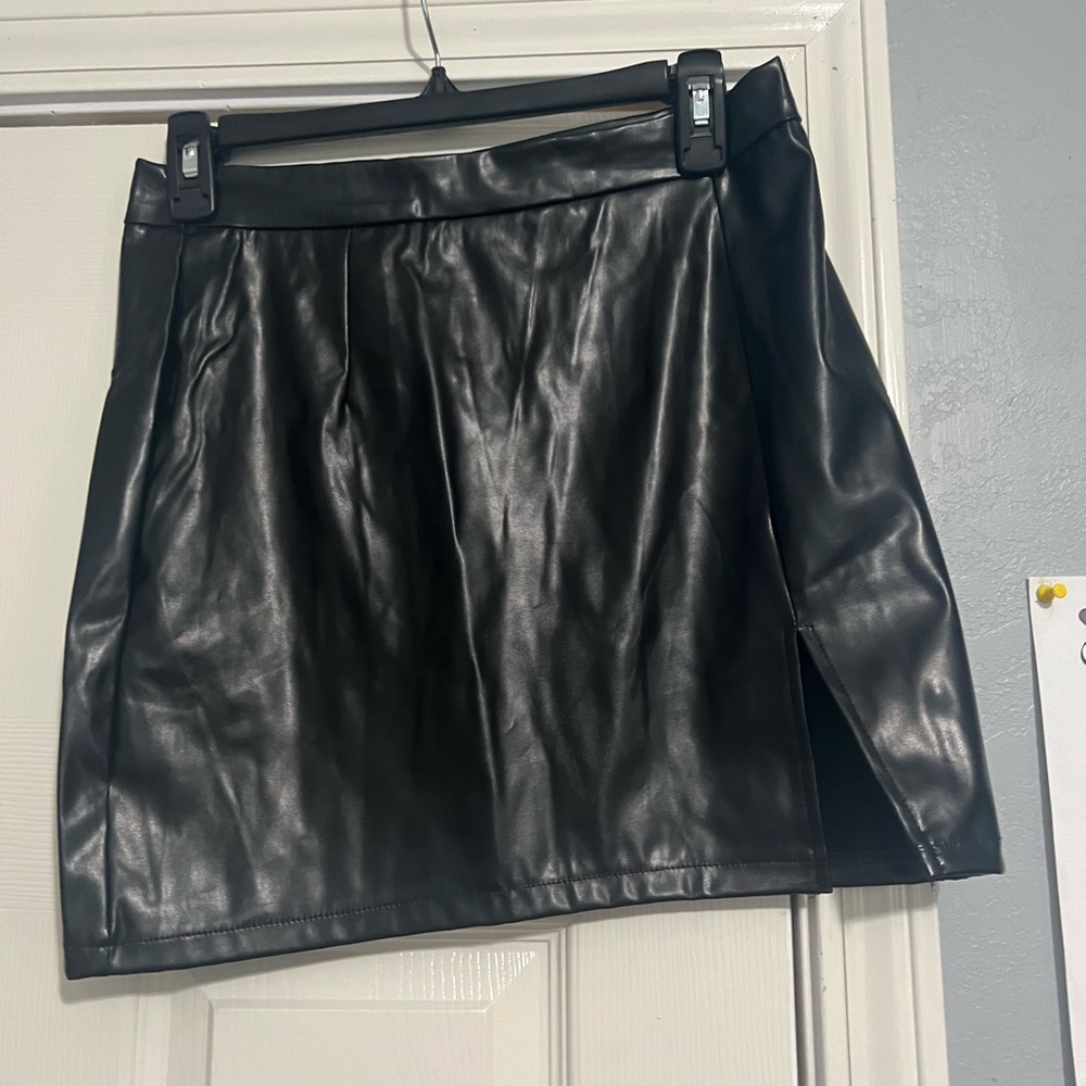 Black leather skirt with slit